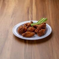 Party Wings · Cooked wing of a chicken coated in sauce or seasoning.