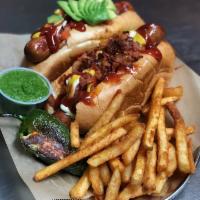 Estilo Sonora · Hot dog wrapped  with Bacon, chorizo,Guacamole, Anaheim peppers , Beans, Pico, Mayo, Ketchup...