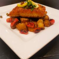 PAN SEARED SALMON   *gf · On a bed of Blistered Cherry Tomatoes, Roasted Potatoes,  Lemon and fried Capers. Topped wit...