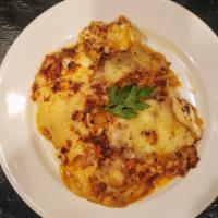 LASAGNA · A homemade cheese lovers Lasagna layered with Ricotta, Pecorino, mozzarella, bechamel and a ...