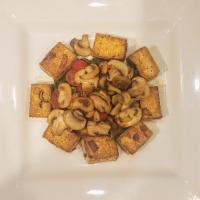 GRILLED TOFU   *gf v · On a bed of Sautéed Mixed Greens, Mushrooms,  Cherry Tomatoes, Garlic, Rosemary, White Wine ...