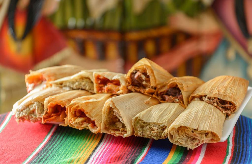 Tamale · Your choice of chicken, pork or beans wrapped in cornmeal dough and steamed in corn husks.