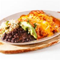 Enchiladas · Your choice of protein wrapped in 2 corn tortillas topped with ranchera salsa and melted che...
