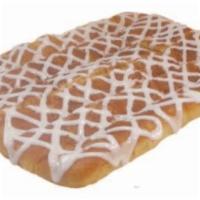 Cinnamon Stix · Oven baked bread stix, sprinkled with 
cinnamon sugar mix and vanilla icing.