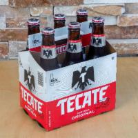 6 Bottled Tecate Mexican Beer · Must be 21 to purchase. 4 % ABV. Easy to drink with a slightly sweet hint of corn.