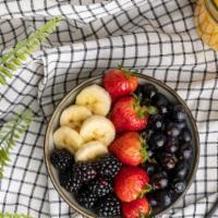 Simple Savory Acai Bowl · Amazonian acai sorbet served with blueberries, blackberries, sliced strawberries and bananas...
