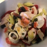 Seafood Salad · Calamari, shrimp, crabmeat, olives, lemon, celery, garlic, olive oil, vinegar peppers.