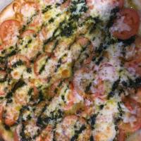 Margarita Pizza · Fresh sliced tomatoes, basil and mozzarella. No sauce.