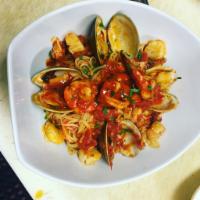 Bucatini Pescatore Dinner · Chopped clams, shrimp and scallops, plum sauce.
