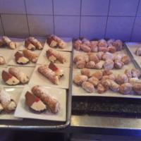 Zeppolies Filled with Cannoli Cream · 5 pieces.