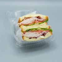 Club Sandwich · Turkey, ham, bacon, american cheese, lettuce, tomatoes, mayo on choice of bread.