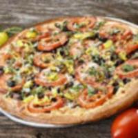 Peace in the Middle East Pizza · Homemade hummus, vine ripe tomatoes, black olives, caramelized onions, feta, fresh basil, pe...