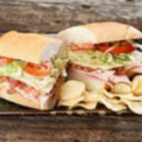 Club Carve Monster Sub · Smoked bacon, turkey, spiced ham and a choice of Swiss or provolone cheese includes mayo, Di...