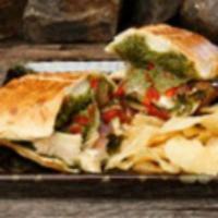 Chicken Pesto Sub · Tender chicken with pesto, caramelized onions, sun-dried tomatoes and provolone. Served heat...