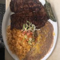 Plato de Carne Asada · Carne asada plate. Served with rice, beans and tortillas.