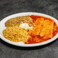 Enchiladas Combo · Served with rice and beans.