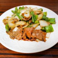 77. Pepper Steak with Onion · Stir fried steak with vegetables and a savory sauce.