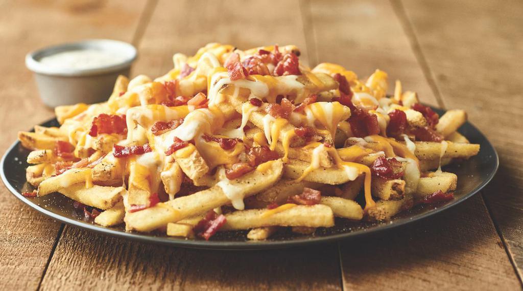 Aussie Cheese Fries  · Topped with melted Monterey Jack and Cheddar cheeses and chopped bacon, with house-made ranch dressing for dipping.