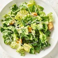 Side Caesar Salad  · Romaine lettuce and croutons tossed with traditional Caesar dressing. Topped with freshly gr...