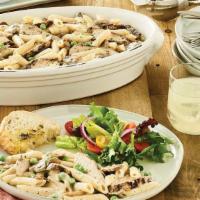 Pasta Carrabba · Penne Alfredo with grilled chicken, sautéed mushrooms and peas.