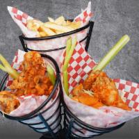 CHICKEN WINGS COMBO (6) · Tossed with a BBQ or Buffalo sauce and served with french fries. Wings only.