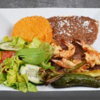 CARNE ASADA CON CAMARONES · Grilled Steak with Grilled Shrimp, served with rice, beans, pico de gallo, grilled cebolline...