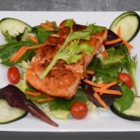SALMON SALAD · Grilled Salmon with lettuce, red onion, tomato, cucumber, avocado slice and house dressing.