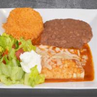 3 ENCHILADAS DE POLLO, ARROZ Y FRIJOLES · 3 Chicken rolled handmade tortilla filled with cheese, served with rice, beans and sour crea...