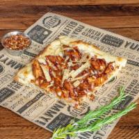 Barbecue Chicken Pizza ·  cheddar, red onions, tortilla strips, and  bbq sauce