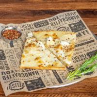 Cheesy Ricotta Pizza · fontina, mozzarella, chili flakes, shaved garlic, and white sauce