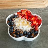 Selfie Bowl · Base: acai, banana, mango, pineapple coconut milk. Toppings: gluten free or vegan granola, s...