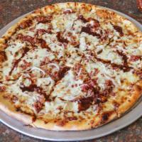 Barbecue Pizza · Barbecue sauce, chicken, bacon, onion and extra cheese.