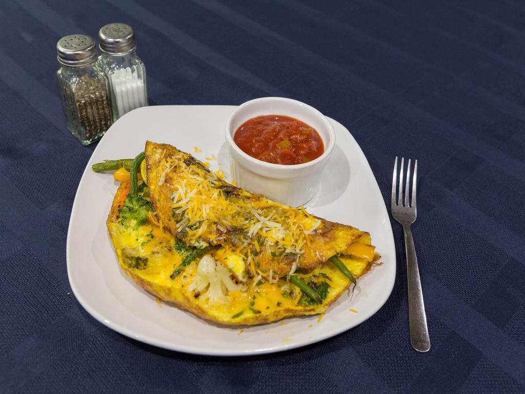 Omelet · Egg omelet filled with your choice of a variety of meats, cheeses and veggies.