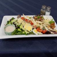 Cobb Salad · Salad that it typically made with chopped greens, vegetables, eggs, and meat. 