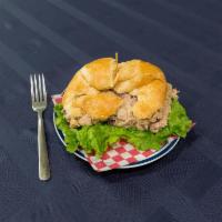Croissant · A light flaky croissant filled with smoked turkey, Virginia ham or tuna salad, cheese, fresh...