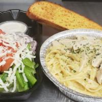 Chicken Alfredo · Fettuccine tossed with homemade Alfredo sauce and topped with grilled chicken.  