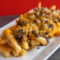 Beef Supreme Fries · French fries loaded with delicious melted cheese over ground beef topped with our delicious ...