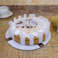 Dulce de Leche Cheesecake · A cookie crumb base holds a velvety dulce de leche cheesecake, topped with dulce de leche mo...
