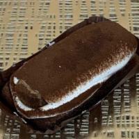 Tiramisu Individual · Traditional tiramisu made with espresso soaked ladyfingers and mascarpone cream and dusted w...