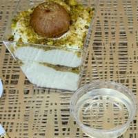 Ashta Cup · Comes with ashta cream, pistachios and eclairs inside with syrup.