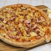 Tropical Hawaiian Pizza · Homemade pizza sauce and loaded with lean Canadian and smoked bacon, juicy pineapple, melty ...