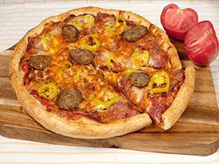 Primo Capicollo · Top seller. Italian sausage, freshly sliced capicollo and pepperoni, freshly chopped garlic, hot banana peppers, melty cheddar, and our signature gourmet cheese blend.