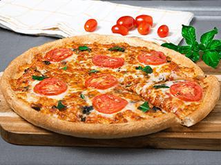 Pizza Margarita · Slices of ripe Roma tomatoes, fresh chopped basil, and our signature gourmet cheese blend.