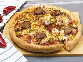 Midnight Express Pizza · Pizza sauce, spicy ground beef, freshly sliced salami and pepperoni, spicy Italian sausage, jalapeños, red chili peppers, and our signature gourmet cheese blend.