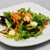 The Palm Mixed Green Salad · Romaine, iceberg, baby greens, radish, scallions, cherry tomatoes, carrots, tossed in garlic...
