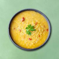 Divine Yellow Lentil (Vegan) · Slow-Cooked lentils tempered with spices and whole red chilies 