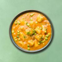 Potato & Green Peas (Vegan) · Peas and potatoes, simmered to perfection in an onion, tomato and Indian curry 