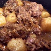 Neck bones  · Smothered and tender neckbones, served with potatoes and homemade gravy. Served with 2 sides...