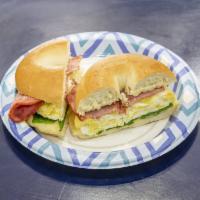 2. Flying Pig on Bagel · Turkey bacon, Swiss cheese, eggs, and spinach.