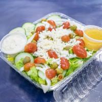 Greek Salad · Romaine, tomato, cucumber, onion, olives feta cheese.
